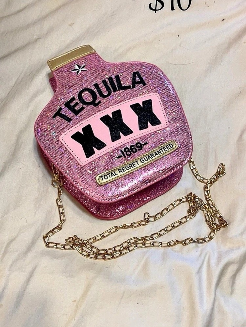 Pink glitter, tequila purse